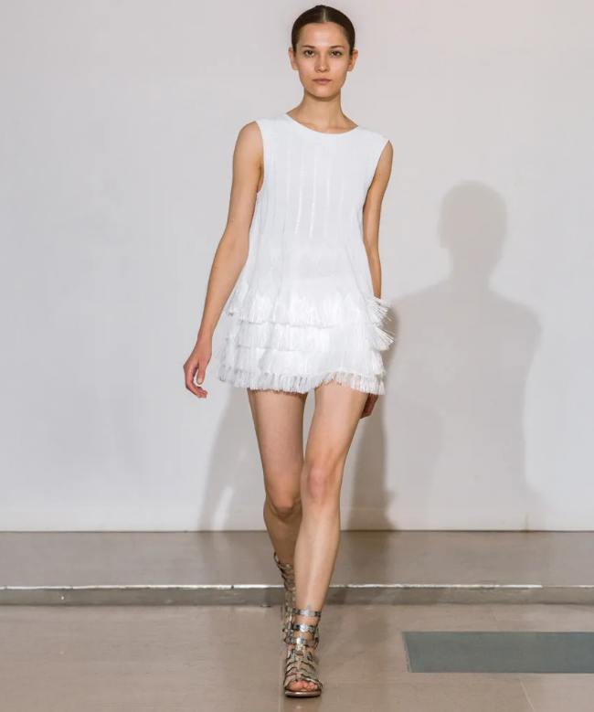 Location Robe de soirée Alaïa, modèle Patineuse Frangée Blanche 1